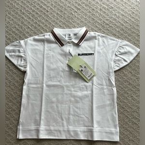Burberry polo for girls in white size 12.